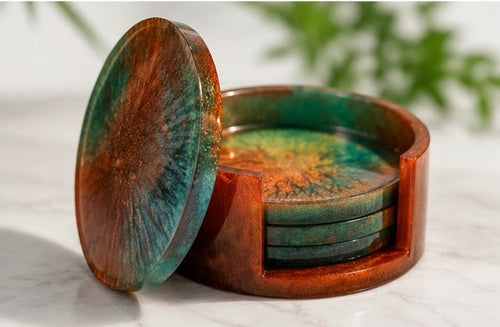 Set of 4 handmade resin coasters in orange and teal