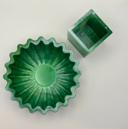 Emerald green resin bowl and cube vessel set, angled view